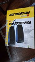 Photo of the Inland Pro Sound 2000 speaker box showing the product name and picture of speakers
