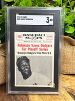 Front view of the 1961 Nu-Card #428 Jackie Robinson card in SGC holder showing headline and photo
