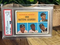 Front image of 1961 Topps baseball card #41 showing National League 1960 Batting Leaders with player portraits of Willie Mays, Roberto Clemente, and others encapsulated in PSA slab graded VG-EX 4.