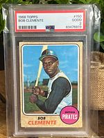 Front of 1968 Topps Bob Clemente baseball card graded PSA 2 Good in slab showing player in Pirates uniform with bat and PSA label.