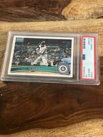 Front of the 2011 Topps Ichiro Suzuki baseball card graded PSA 10 Gem Mint in plastic case.