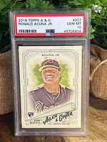 Front of 2018 Topps Allen & Ginter Ronald Acuna Jr rookie card in PSA slab graded Gem Mint 10 showing player artwork and card details.