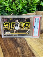 Front of Caitlin Clark basketball rookie card showing scoring record and PSA 10 Gem Mint grade