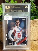 Front photo showing Mick Schumacher racing card graded 9.0 by FCG, encased in plastic slab.