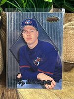 Front view of Roy Halladay Bowman’s Best rookie card in Toronto Blue Jays uniform, holographic design.