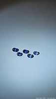 Five natural untreated oval cut blue sapphires in cornflower and denim blue shades with VS-VVS clarity.