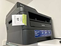 Side and front view of Brother MFC-7860DW printer with model and brand information visible.