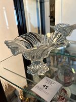 Side view of the Mikasa Belle Epoque heavy crystal footed pedestal bowl showing the swirl design and ruffled edges