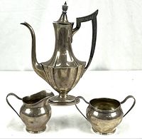 Gorham coffee pot with National Silver cream pitcher and sugar bowl