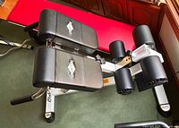 Overall view of bench showing pads, rollers and frame