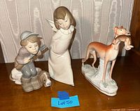 Group shot of all three figurines on shelf