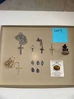 Overview of all jewelry items arranged on tray
