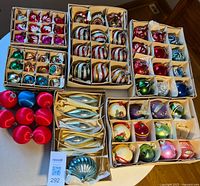 Overview of all boxed vintage ornaments showing quantity and variety