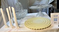 Group view: crystal basket, crystal cake stand, Wilton separator plate, five support pillars