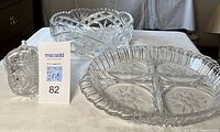 Three crystal pieces: divided dish, large bowl, lidded sugar bowl