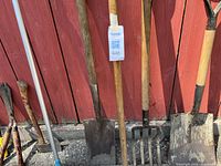 centre close-up of shovel, spade and pitchfork