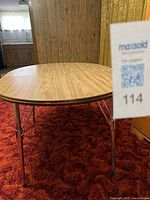 Full view of oval arborite dining table