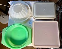 All four Tupperware items, lids on