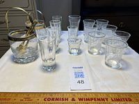 Front view showing all glasses, ice buckets and tongs