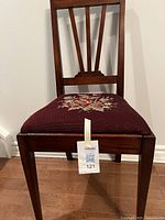 Front view showing chair structure and upholstery