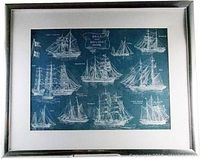 Front view of the matted and framed nautical art print showing ship illustrations on blue background with frame and matting.