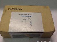 Box of Powergen 3.4 Amp Wall Charger with label detailing model PGAC17W and specifications 3.4 Amps, 17W power output.