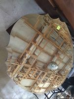 Top view of the large, scalloped decorative mirror face, showing its size and edge design.