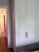 Closed white double-door wardrobe showing overall appearance