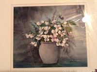 Framed watercolour painting of white flowers in a vase with signature visible.