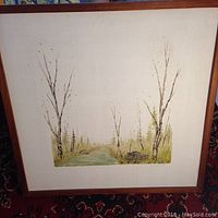 Full view of framed painting showing a natural landscape with birch trees and a path.