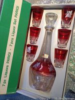 7 piece set in box: 1 decanter with 6 matching glasses