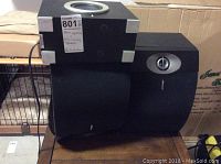 Two Bose 301 V speakers stacked on and alongside an Altec Lansing VS2621 powered speaker.