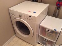 Washer angled view showing front and side