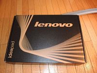 Lenovo Ideapad laptop box, black with gold Lenovo and Ideapad branding