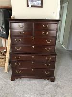 Full front view of the chest on chest dresser