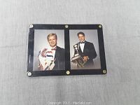 Framed dual portrait photos of Pavel Bure holding a Canadiens jersey and Valeri Bure holding a trophy, both signed.