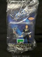 Full view of signed Babylon 5 Susan Ivanova action figure in original sealed packaging, showing card artwork, signature, and accessory included.