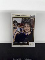 Front view of signed Teemu Selanne Score hockey card with autograph shown clearly.