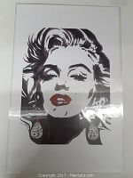Glossy native art print featuring Marilyn Monroe's face in black, white, and red color scheme.