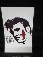 Print showing black stylized profile of Elvis Presley with red bird and black Native American bear claw design on white background