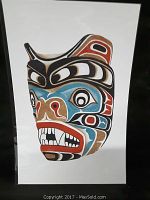 Photo of Native American-style mask art print signed by HV Billy, showing full print and frame.
