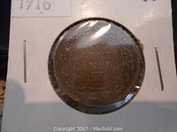 Image of the reverse side showing 'ONE CENT CANADA 1916' with wreath design and labeled '1916'.