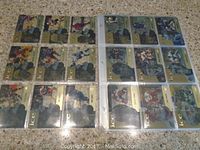 Two pages of hockey trading cards featuring players in action, with 'ICE' gold accented cards, all sleeved