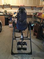 Front view of assembled inversion table in garage