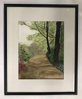Framed watercolor painting on paper of a forest path, showing trees and dirt path surrounded by greens and some reds, under glass with black frame and white mat.