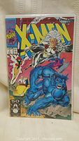 Front cover of Marvel X-Men issue #1 comic book showing main characters Storm and Beast, with price and issue number clearly visible.
