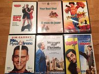 Photo showing 7 assorted DVDs including Spy Hard, Your Best Shot, Kung Pow, Me Myself & Irene, Stranger than Fiction, Bean Disaster Movie, and Mr. Bean's Holiday.