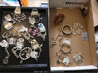 Overview of multiple bracelets in original packaging and display
