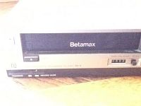 Front view of Sony Betamax with Betamax tape inserted and mechanical counter reading 4000.