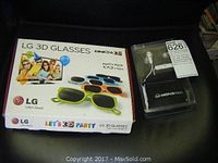LG 3D glasses 5-pack in original box with colorful 3D glasses shown on front and sides.